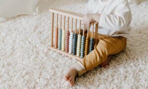 Young Child Playing on a Clean Carpet.